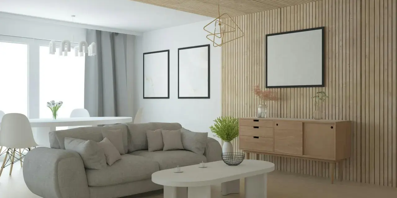 Nowoczesny salon z szarą sofą, drewnianą komodą i ozdobną **flizeliną** na ścianie.