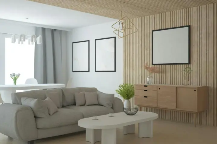 Nowoczesny salon z szarą sofą, drewnianą komodą i ozdobną **flizeliną** na ścianie.