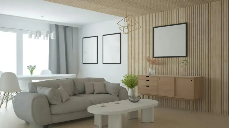 Nowoczesny salon z szarą sofą, drewnianą komodą i ozdobną **flizeliną** na ścianie.